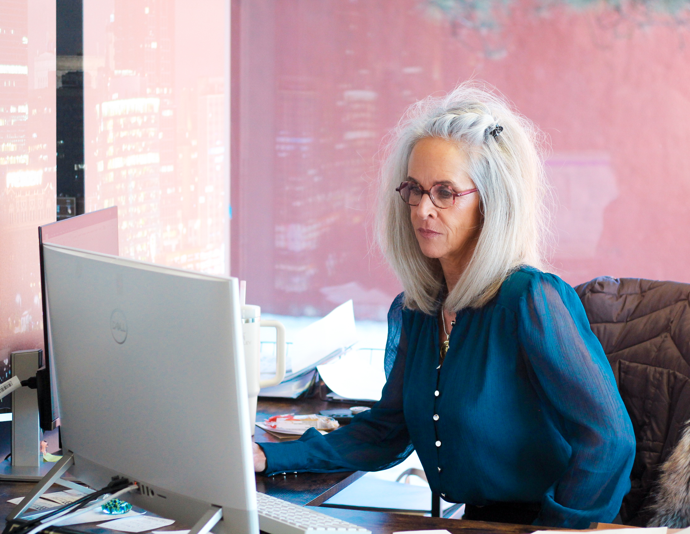 missouri personal injury compensation - paralegal Christal Carlisle working at desk