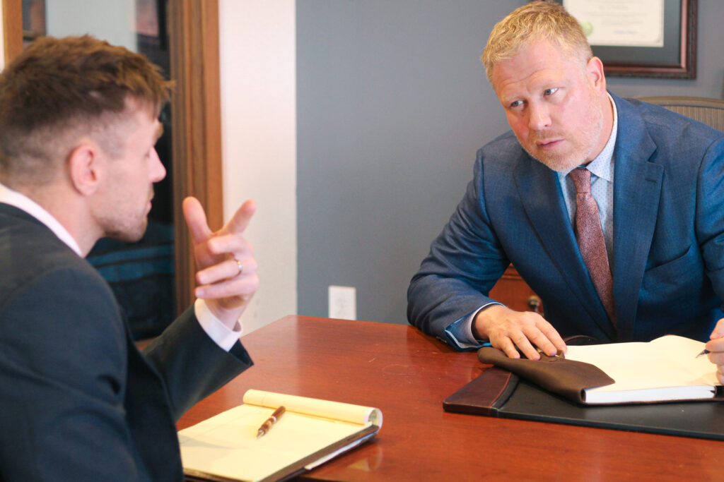 Kansas City personal injury lawyers consult with one another