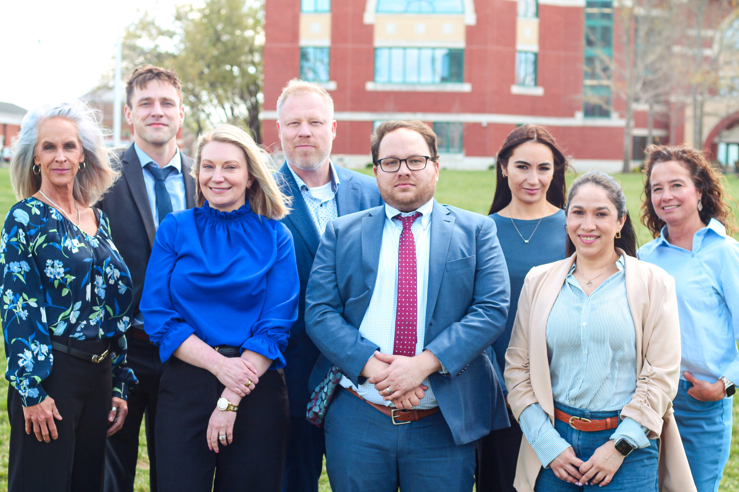 Missouri social media harm lawyers at Wallentine Injury Law stand in two rows for picture